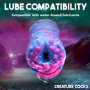 Creature Cocks Cyclone Squishy Alien Vagina Stroker with lube compatibility note in vibrant colors suitable for water-based lubricants.