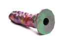 Vibrant iridescent Creature Cocks Larva Silicone Ovipositor Dildo with shades of pink, green, orange, and purple.