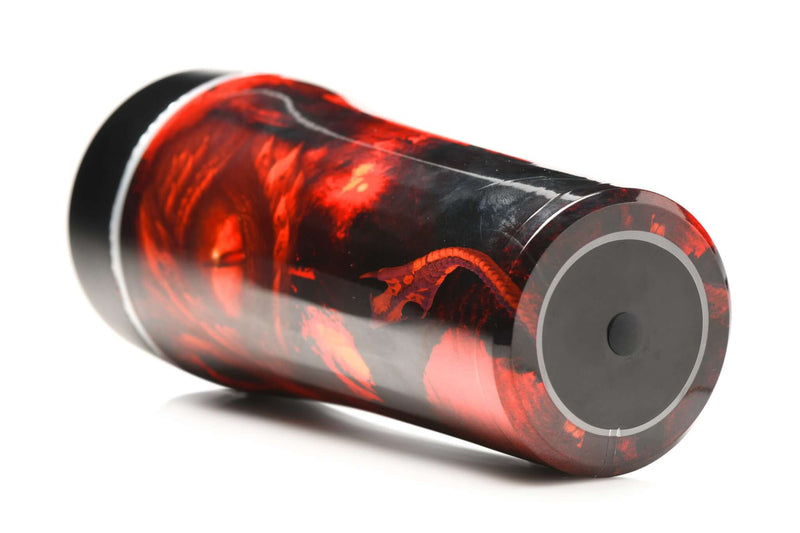 Fiery red Dragon Snatch Silicone Stroker by XR Brands with dragon-scale design on its exterior.