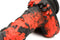 Fire Demon Monster Silicone Dildo by XR Brands in red and black design with spiky, textured details for sensual pleasure.