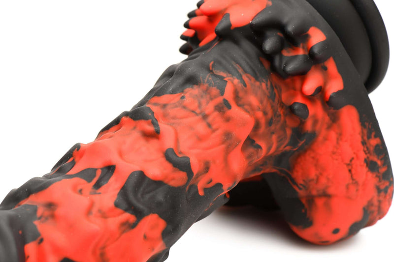 Fire Demon Monster Silicone Dildo by XR Brands in red and black design with spiky, textured details for sensual pleasure.