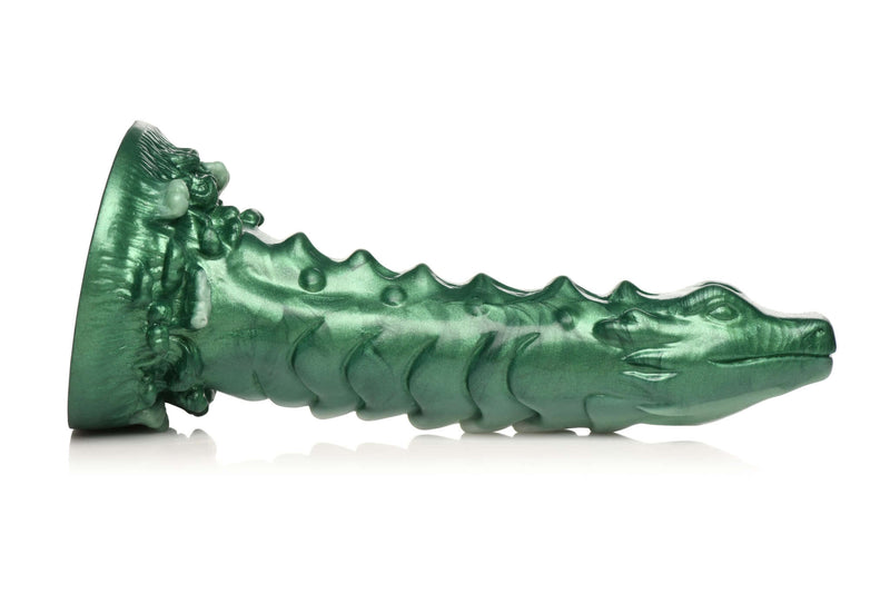 Mystical Lake Monster silicone dildo by XR Brands with dragon-inspired design, iridescent green color, and textured scaly shaft.