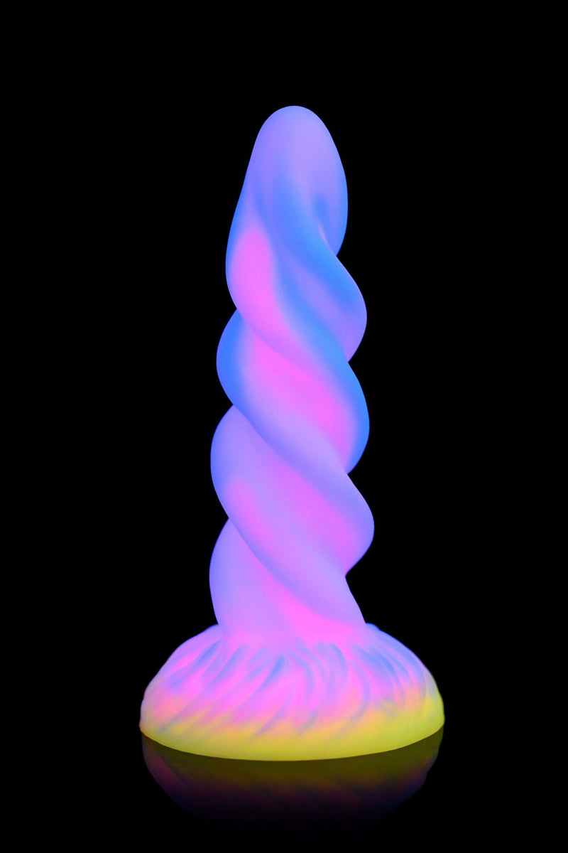 XR Brands Creature Cocks Moon Rider Glow In The Dark Unicorn Dildo in magical purple, blue, pink, and yellow colors with glowing effect