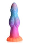 Creature Cocks Galactic Cock glow-in-the-dark alien dildo in vibrant pink, orange, blue, and purple colors with sparkling glitter texture.