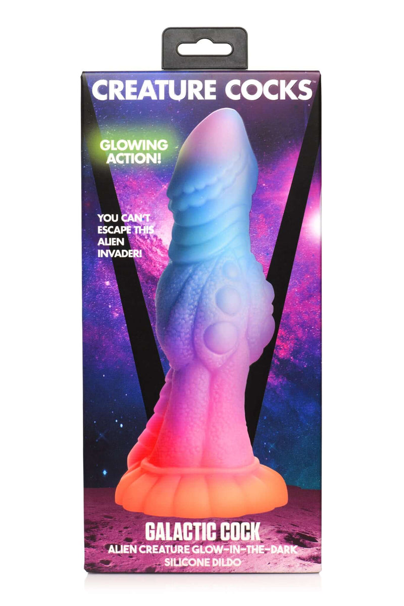Creature Cocks Galactic Cock Glow-in-the-Dark Alien Dildo by XR Brands in packaging with colorful galaxy background