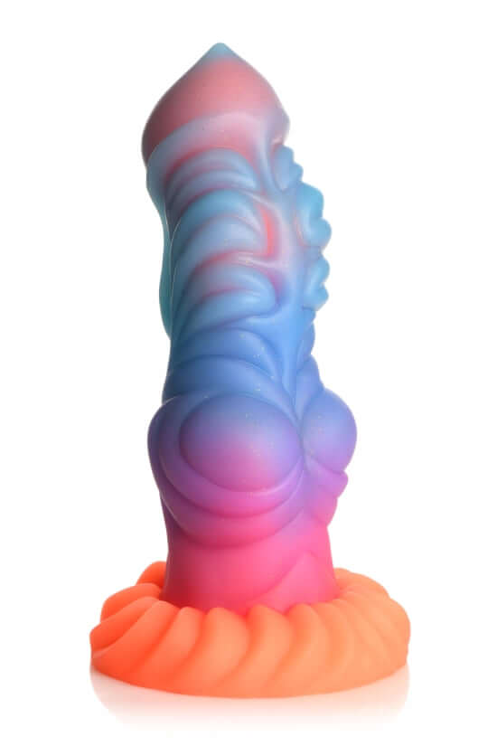 Glow-in-the-dark Alien Invaders dildo with vibrant colors, intricate design, and premium silicone from Creature Cocks.