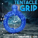 Poseidon's Octo-Ring Silicone Cock Ring by Creature Cocks featuring tentacle grip design and dimensions over underwater background.