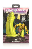 Creature Cocks Orc Silicone Dildo package with fantasy background featuring a green orc figure.