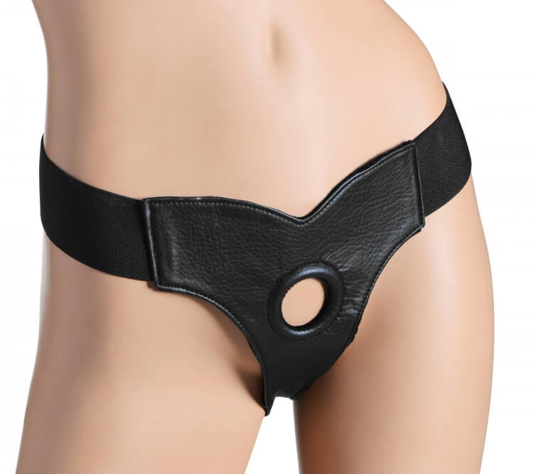 Black leather strap-on harness with adjustable elastic band and round hole for flared base dildos.