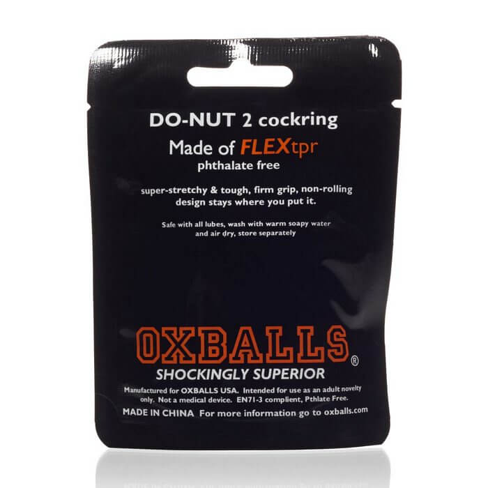 Packaging of Atomic Jock Donut 2 Fatty Cock Ring by Oxballs, showcasing FLEXtpr material, phthalate-free, super-stretchy grip, and firm support.