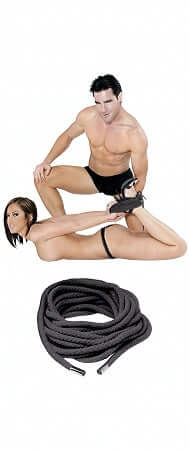 Couple using Fetish Fantasy Series Japanese Silk Rope in black for beginners and shibari bondage play, rope coiled below.