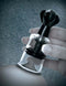 Hand using Fetish Fantasy Limited Edition Super Suckers Black for nipple suction.