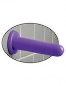 Dillio Mr Smoothy Purple Dong with suction cup base sticking to tiled wall for hands-free use.