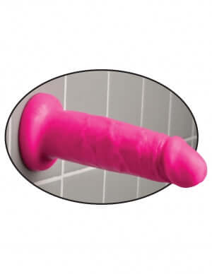Pink Dillio 6 inches Chub Dildo with suction cup base attached to tiled wall.