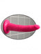 Pink Dillio 7" slim dildo with suction cup base attached to a tiled wall surface.