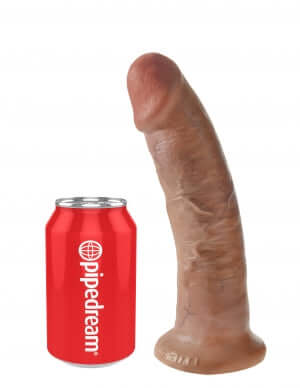 King Cock 9-Inch Tan Dildo next to a Pipedream can for size comparison