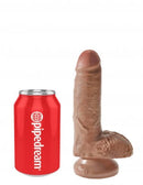 King Cock 7-inch Tan dildo with realistic details and balls next to a red Pipedream soda can for size comparison