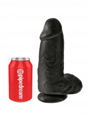 King Cock Chubby 9 inches black dildo with balls and suction cup base next to red Pipedream can for size comparison