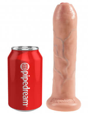 King Cock 7 inches uncut dildo by Pipedream Products beside a soda can for scale