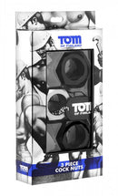 Tom of Finland 3-Piece Cock Nuts set packaging featuring versatile and flexible black cock rings.